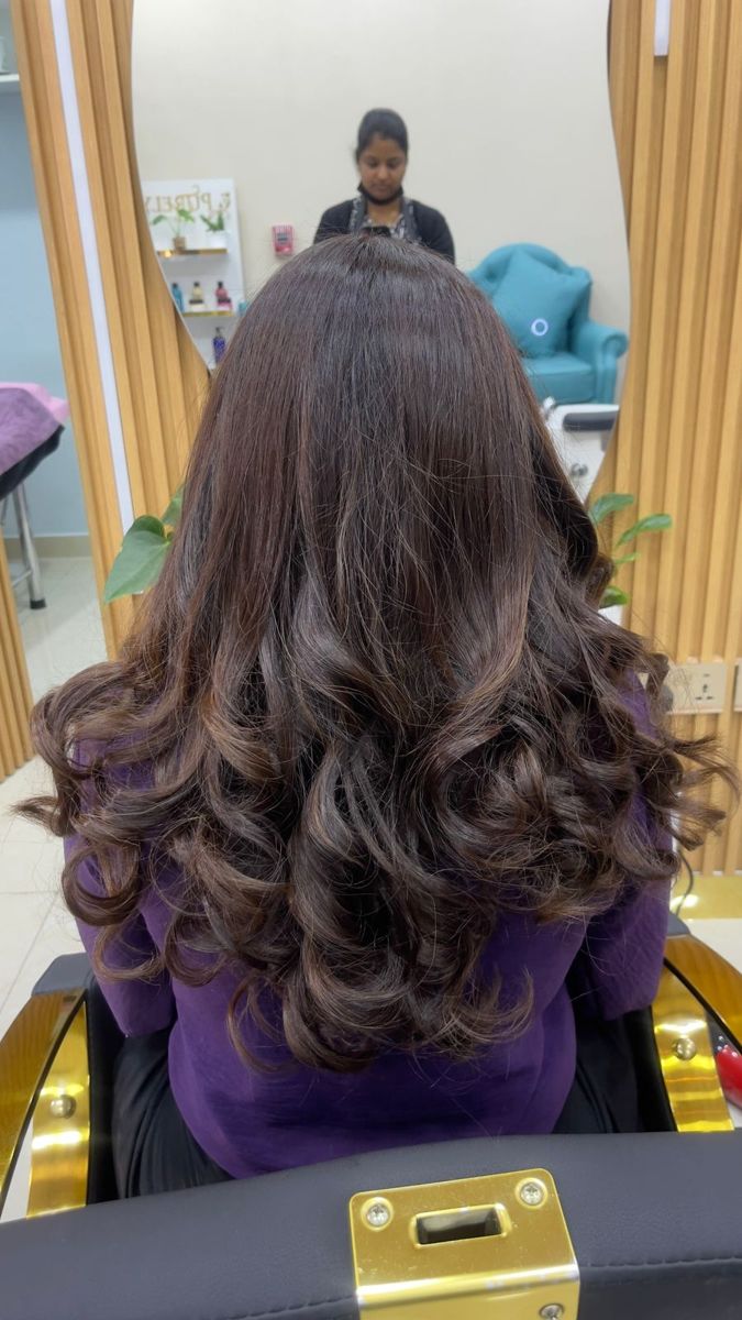 Hair highlights with voluminous curls at Cindy Glow, Al Satwa